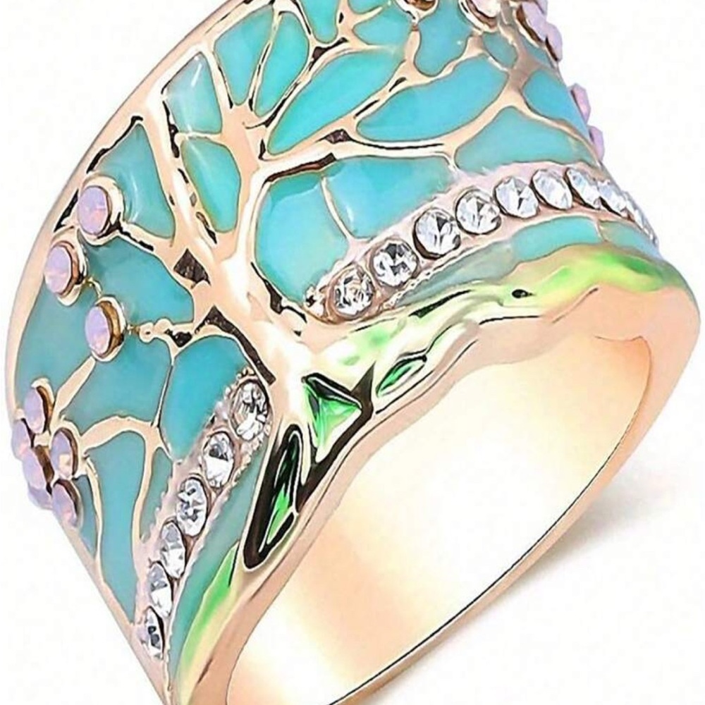 Blue and gold family tree ring size 10

Thanks for shopping 🛍️